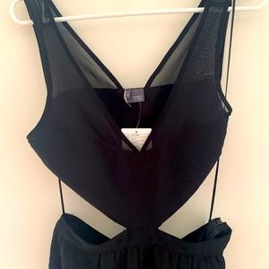 Never worn, black high low cut out formal dress